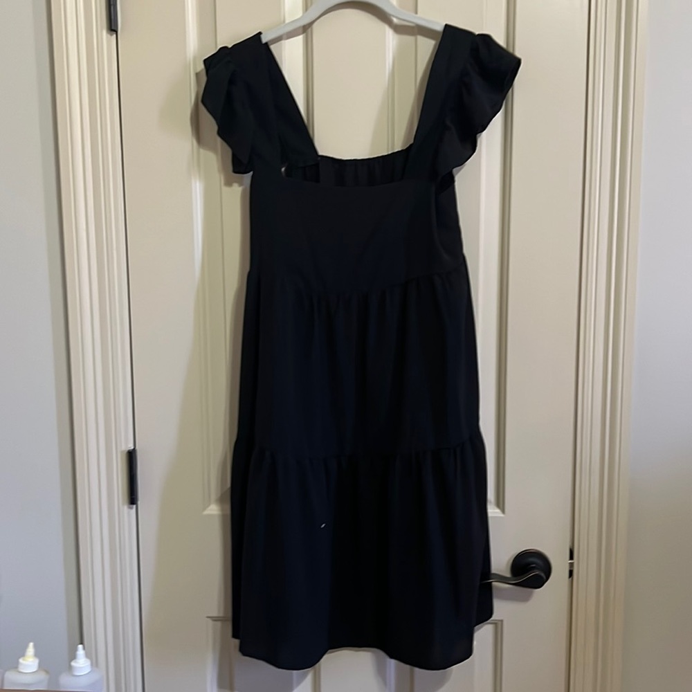Black mini with ruffle sleeve
